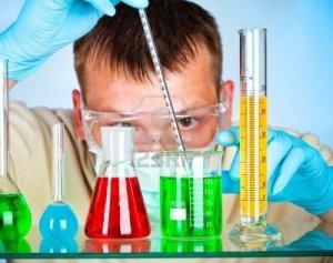 6816976-scientist-in-laboratory-with-test-tubes